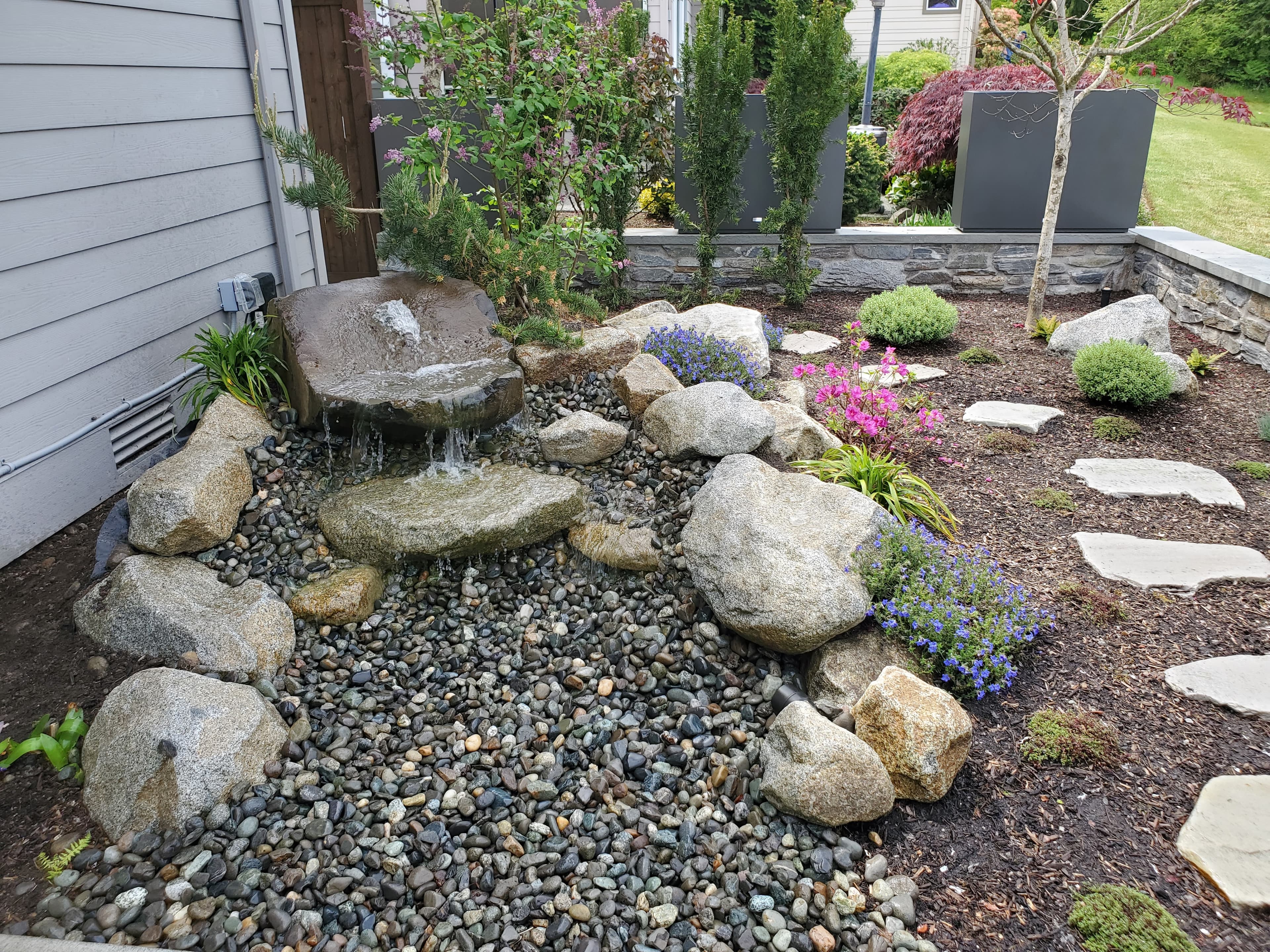 retaining wall, water feature, stones, irrigation, hardscaping, landscaping, lawncare - 20200509_133546.jpg